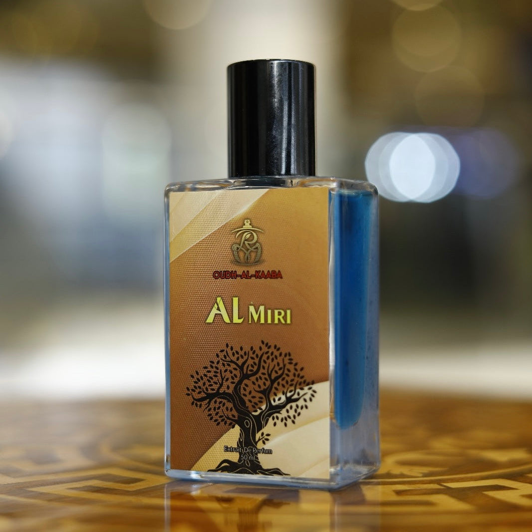 Al Miri perfume bottle on a wooden surface with a blurred background