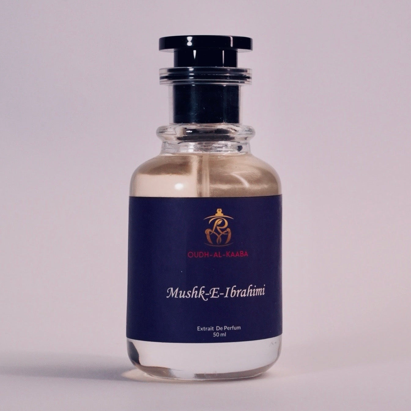 Perfume bottle with a dark blue label on a light gray background